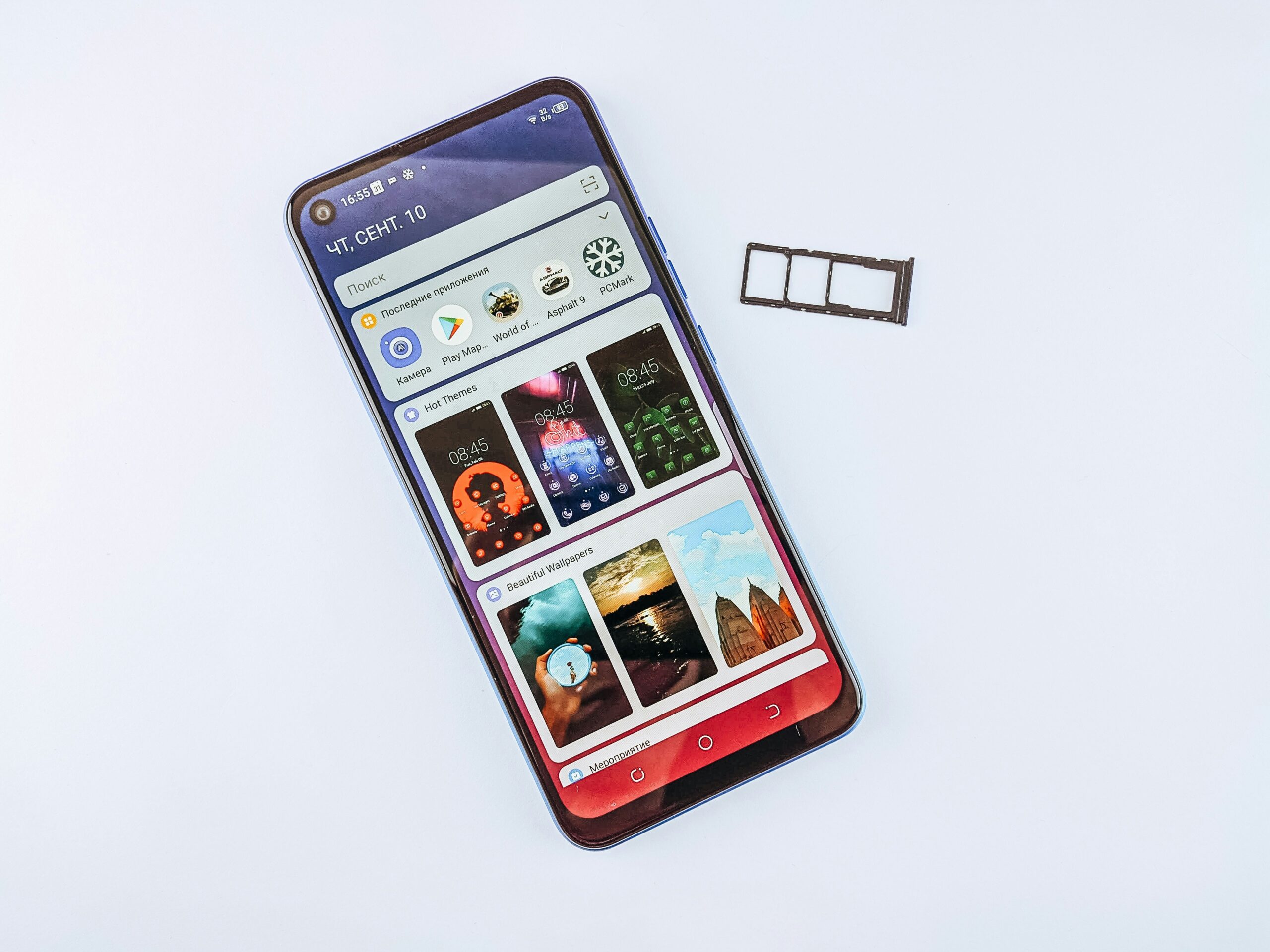 白いテーブルに置かれたスマートフォン(写真: Unsplash)